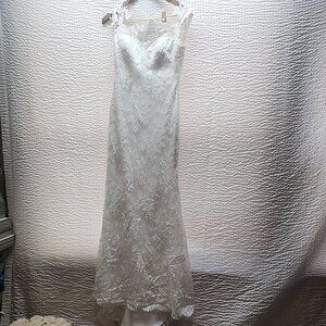 Rosa Clara wedding dress in size 10 in Ivory